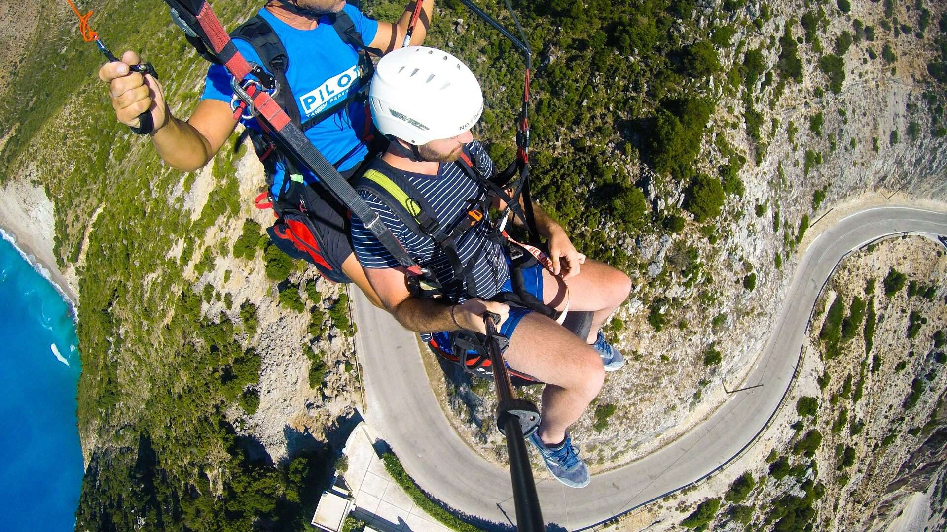 Soaring above Myrtos Beach in Kefalonia, Greece, this thrilling paragliding adventure captures the essence of Kefalonia adventures. The glider offers a unique perspective of the picturesque Greek landscape, blending the excitement of adventure with the natural beauty of Kefalonia. Experience the joy of travel to Greece as the paraglider embraces the azure skies, showcasing the ultimate adventure in this idyllic Mediterranean destination. Explore the wonders of Kefalonia, Greece, through the lens of exhilarating paragliding, a perfect blend of adventure and the allure of Greek travel.