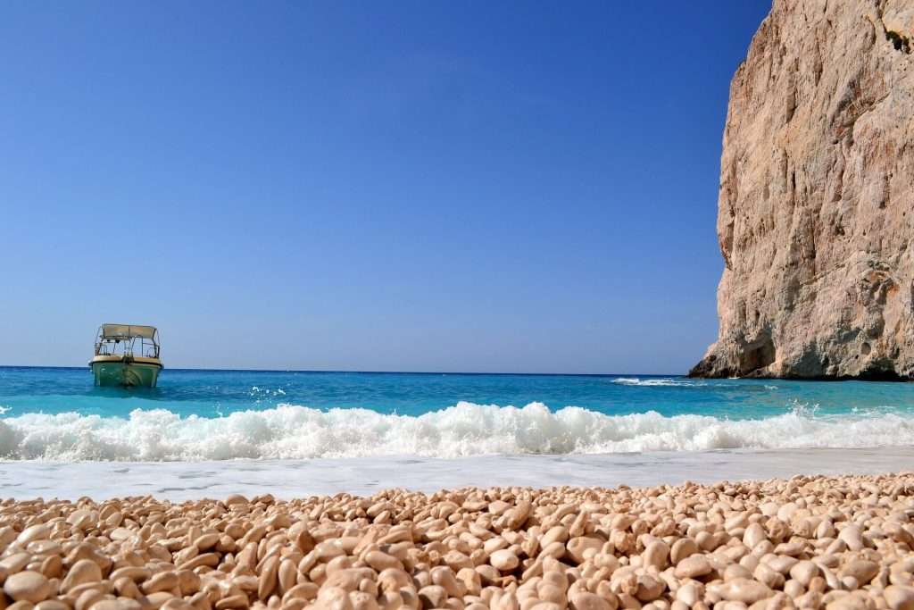 Xygia Beach, Zakynthos, a natural wonder with sulfuric springs and turquoise waters.