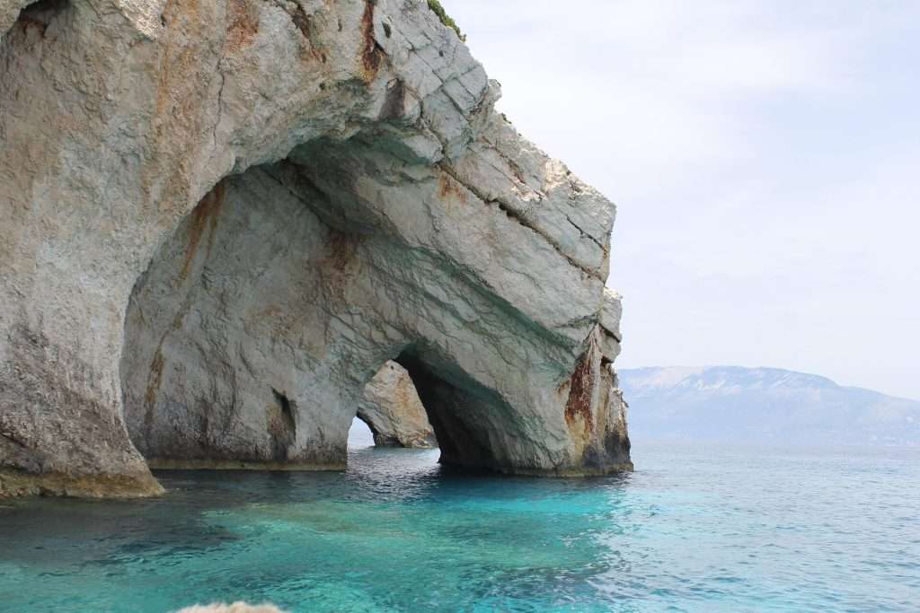 The Blue Caves are a series of sea caves located on the northern coast of Zakynthos, known for their mesmerizing blue waters and unique rock formations